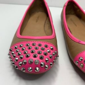 Spiked tan and hot pink flats